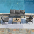 Ensemble de canapés de jardin moderne 4 pièces – Structure en fer avec coussins gris et table basse aspect bois
