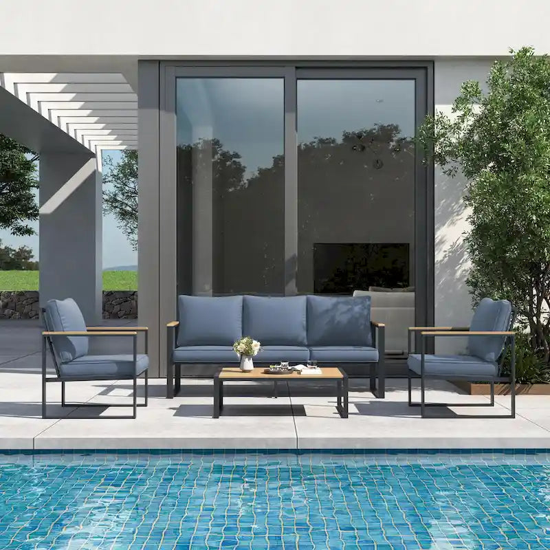 Ensemble de canapés de jardin moderne 4 pièces – Structure en fer avec coussins gris et table basse aspect bois