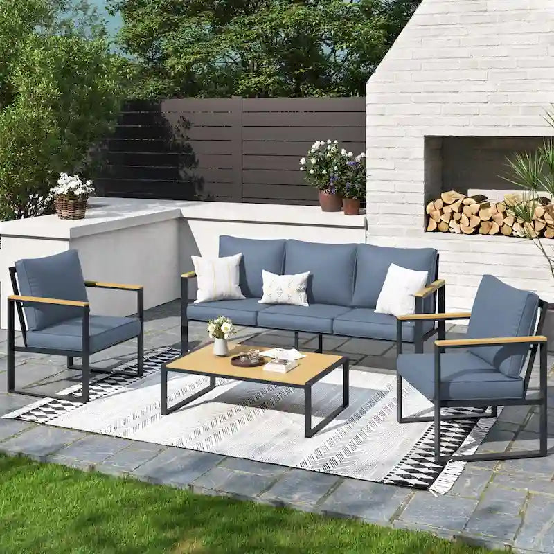Ensemble de canapés de jardin moderne 4 pièces – Structure en fer avec coussins gris et table basse aspect bois