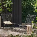 outdoor CHAIR with an earthy wicker finish