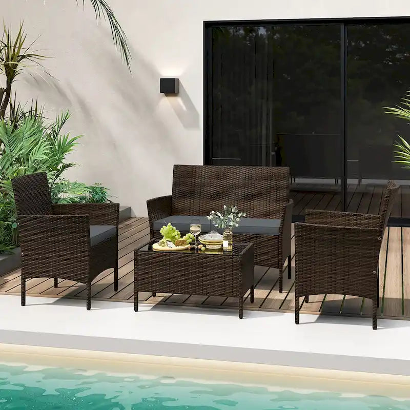 Ensemble de conversation en rotin de patio 4 pièces Gymax Meubles d'extérieur en osier