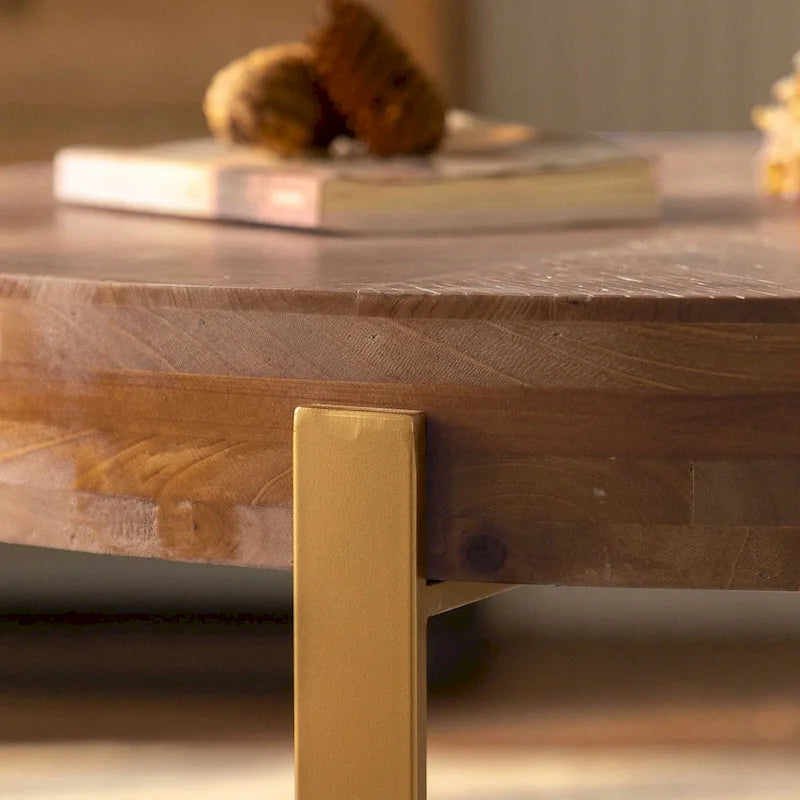 Table basse ronde moderne rétro avec pieds croisés dorés