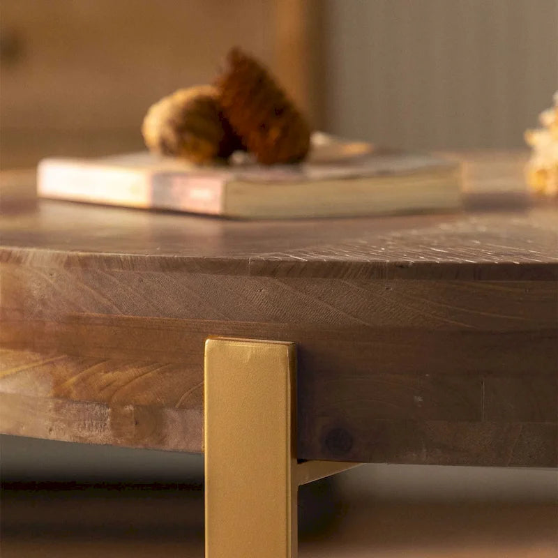 Table basse ronde moderne rétro avec pieds croisés dorés